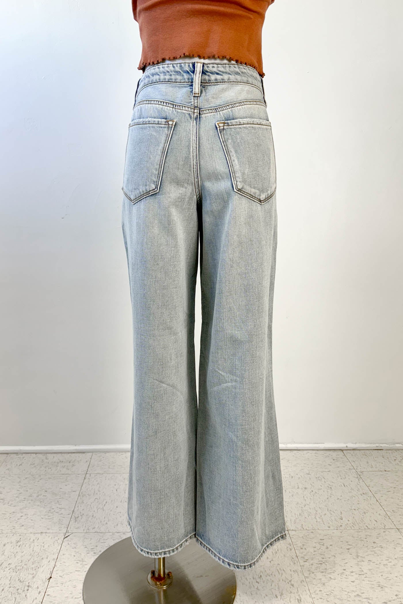 Light blue jeans on a white background