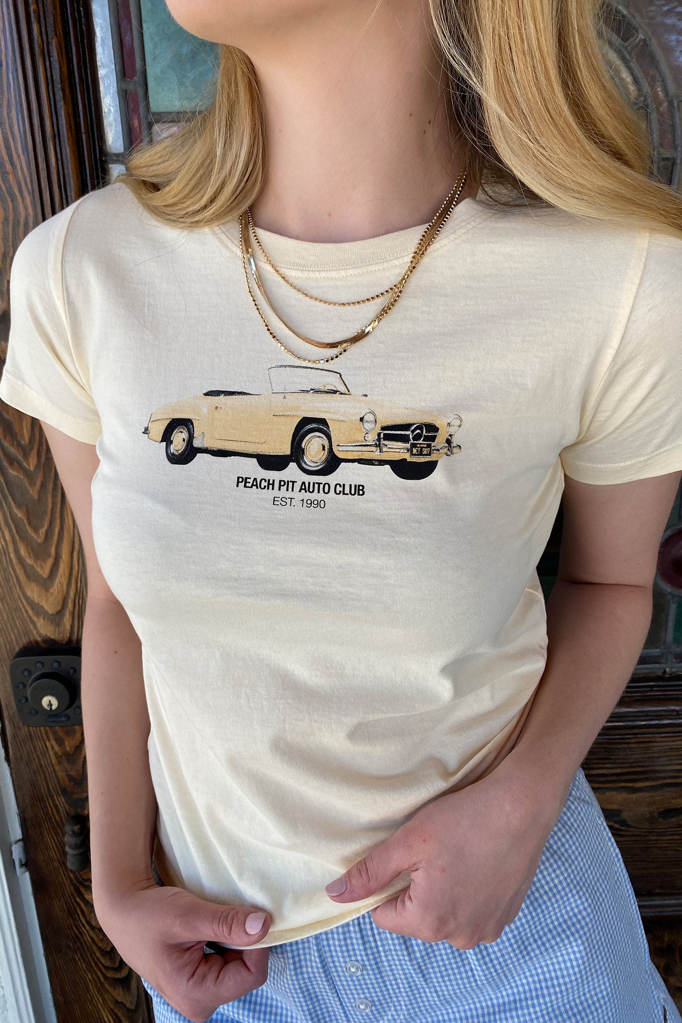 Peach Pit Long Line Graphic Baby Tee