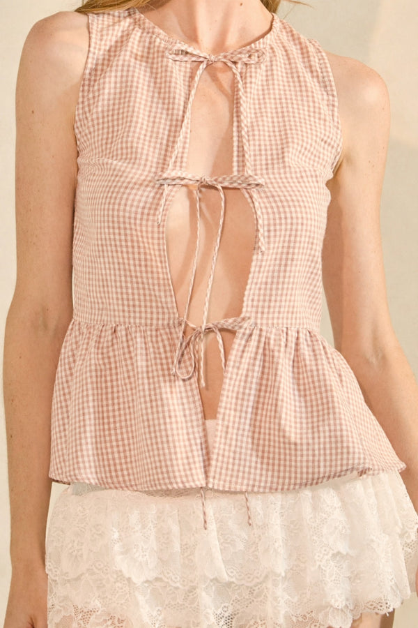 Checkered sleeveless top with lace details on a neutral background